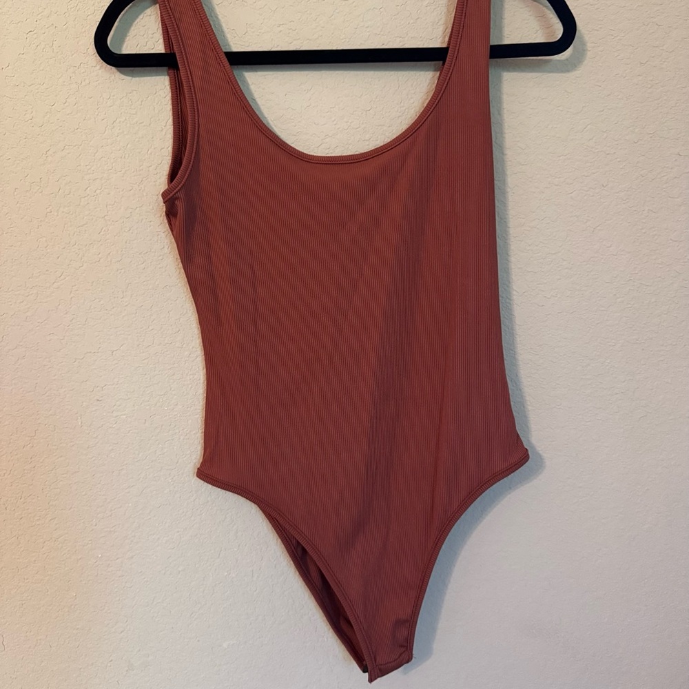 Kids One Piece in Rust by [Brand]